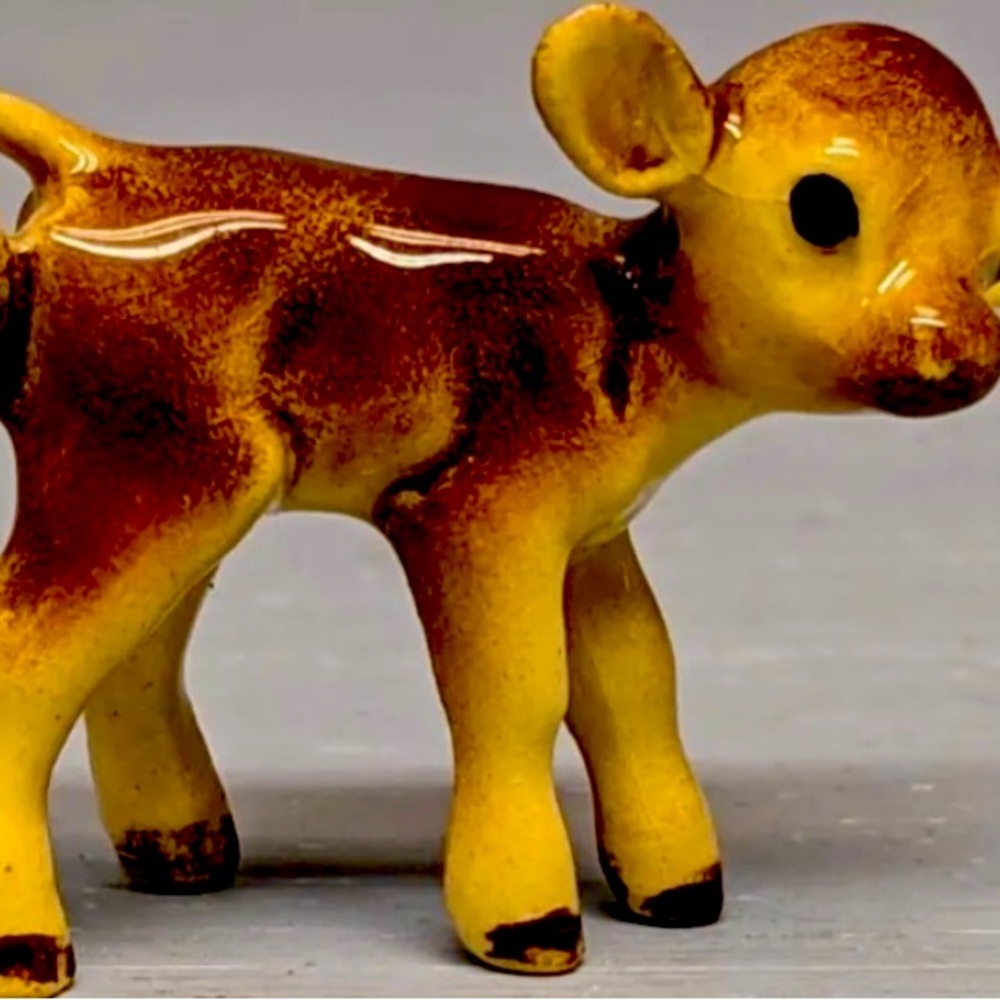 Retired Calf Retired Hagen Renaker Head Down Jersey Calf in great condition.